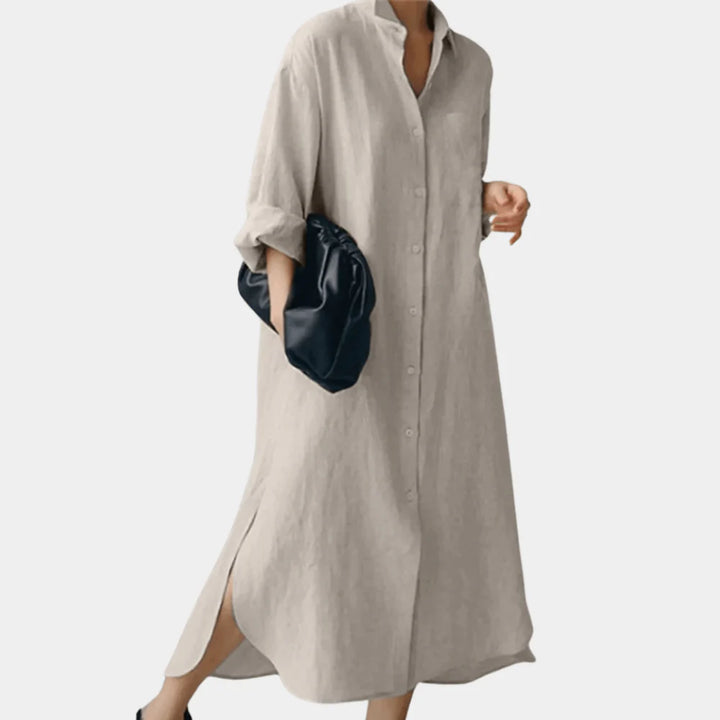 Side angle of oversized shirt dress showing flowing silhouette and button closure