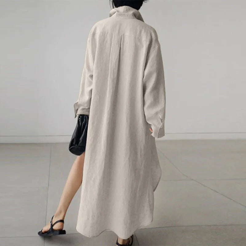 Back view of oversized cotton shirt dress showing relaxed drape and length