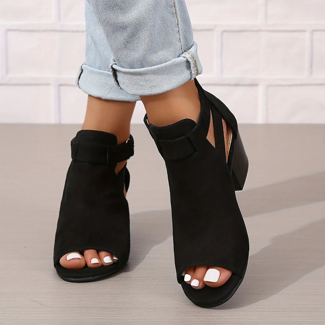 Women's block heel sandals in black with peep toe design and ankle buckle strap fastening