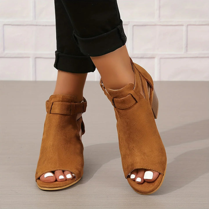 Women's block heel sandals styled with casual wear for spring and summer occasions