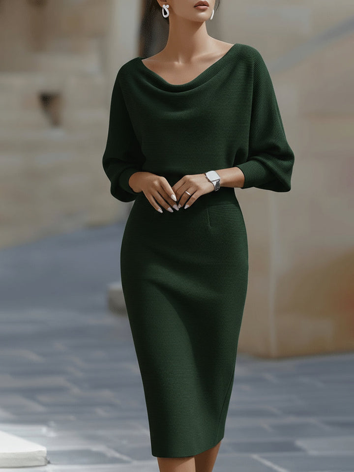 Full-length view of the Women's Boat Neck Batwing Sleeve Midi Bodycon Dress styled with ankle boots