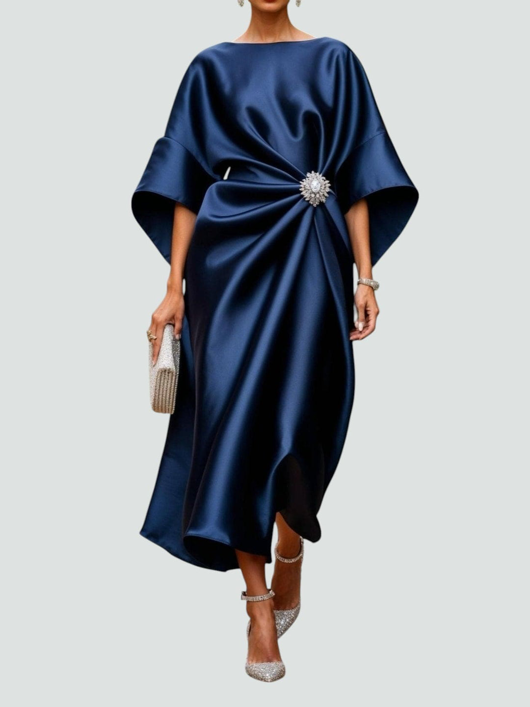 Women's Elegant Draped Brooch Maxi Dress in navy with crystal brooch detail and flowing silhouette