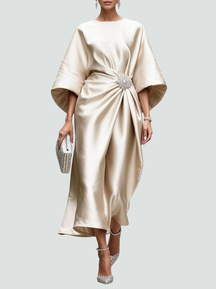 Full-length view of Women's Elegant Draped Brooch Maxi Dress showing flowing midi length