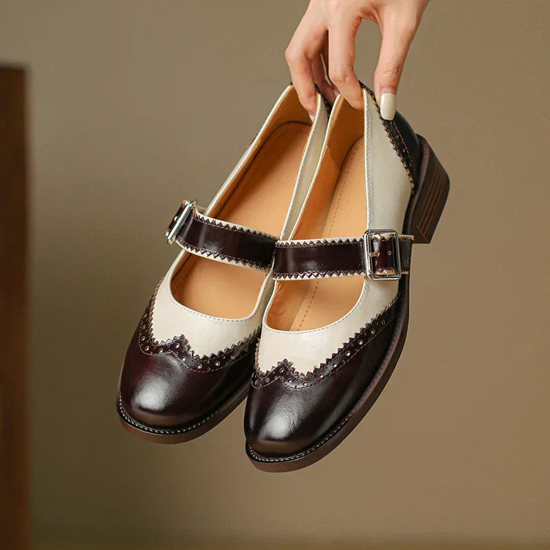 Detail shot of adjustable buckle strap on Women's Everyday Leather Mary Janes with two-tone panel design
