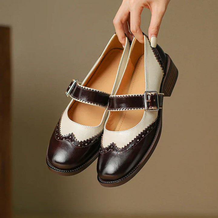Detail shot of adjustable buckle strap on Women's Everyday Leather Mary Janes with two-tone panel design