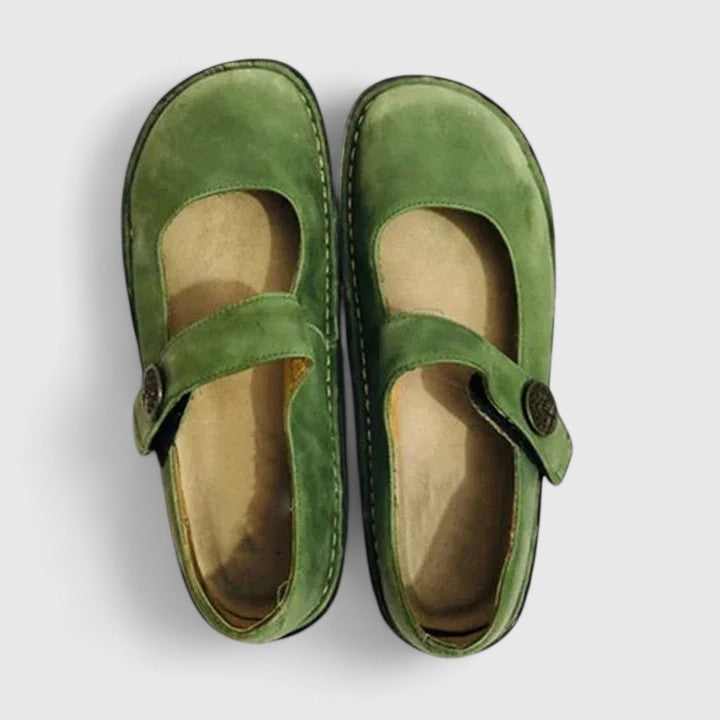 Detail of Mary Jane loafers featuring cushioned insole and smooth finish