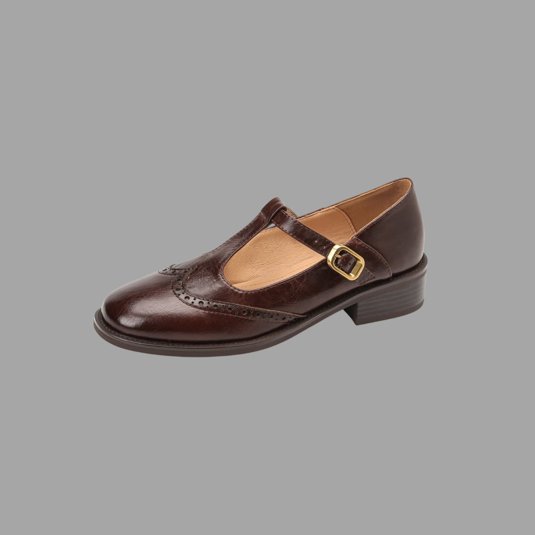 Side view of women's mary jane shoes showing low block heel and cushioned footbed structure