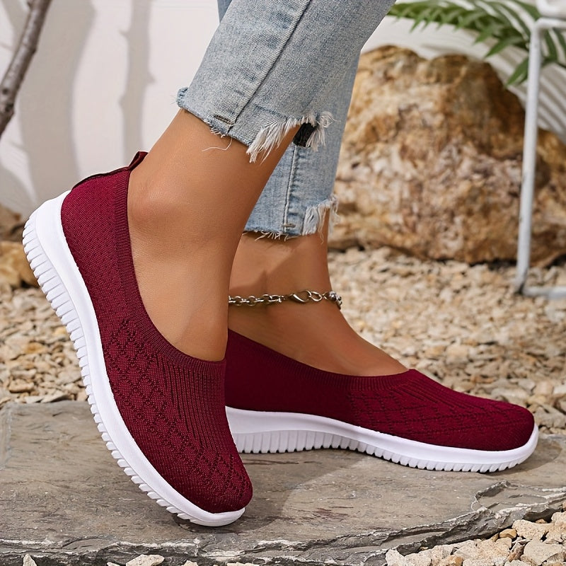 Rear view of Women's Orthopaedic Slip-On Sneaker displaying cushioned heel and flexible sole design