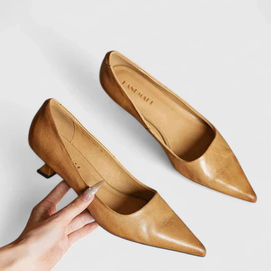 Formal Orthopedic Kitten Heel Pumps paired with tailored black trousers