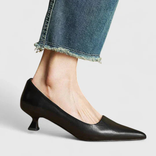 Side view of kitten heel pumps with supportive footbed and low heel design