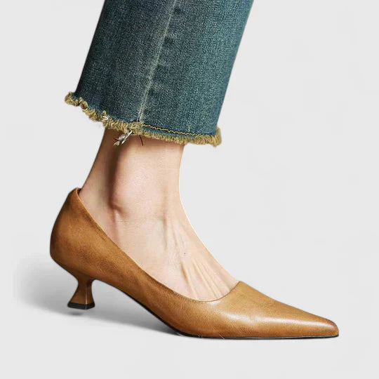 Pointed toe pumps with stable low heel shown from multiple angles