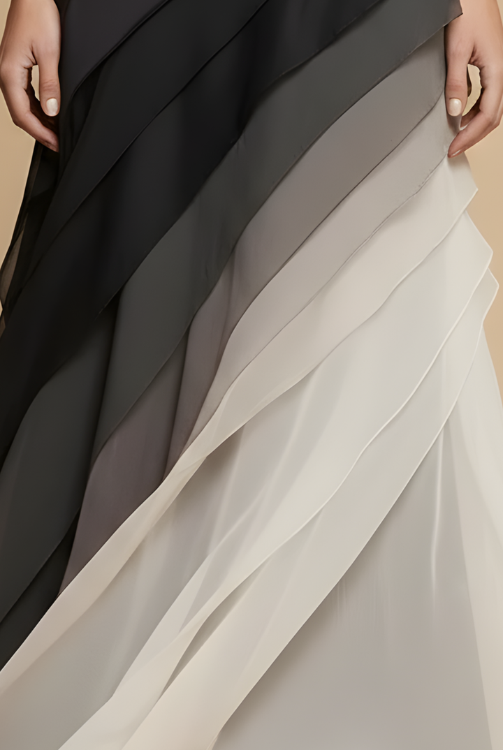 Full-length view of the structured bodice and floor-length ombré chiffon skirt