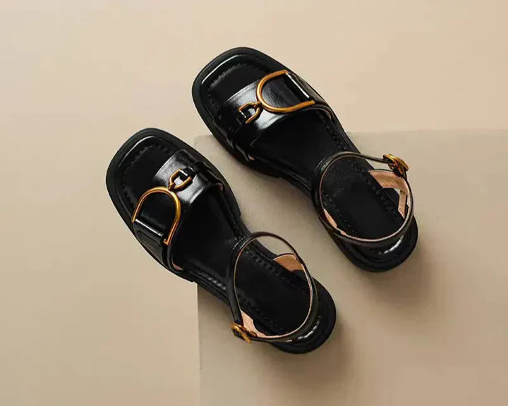Annabelle women's buckled leather sandals in black with square toe and gold-tone ankle strap hardware