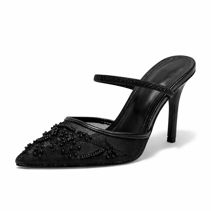 Embroidered mesh slingback heels worn with neutral outfit showing elegant silhouette
