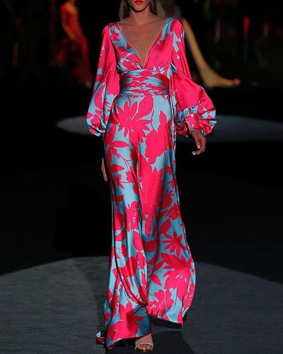Side view of printed maxi dress showing waist-defining silhouette and full-length flowing skirt