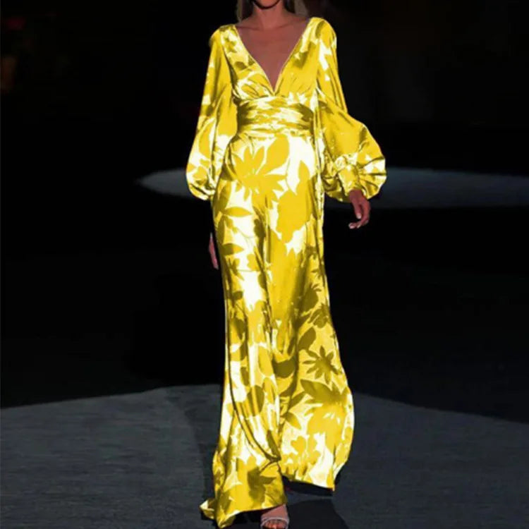 Close-up detail of balloon sleeves and abstract floral print on maxi dress