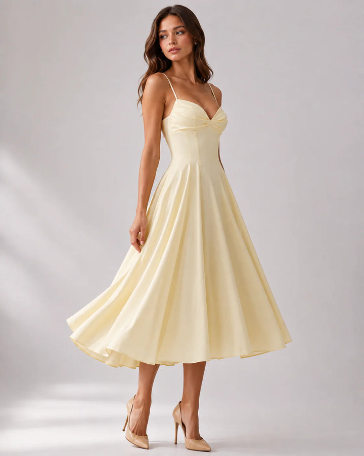 Gathered bust midi dress with spaghetti straps and full A-line skirt in soft yellow