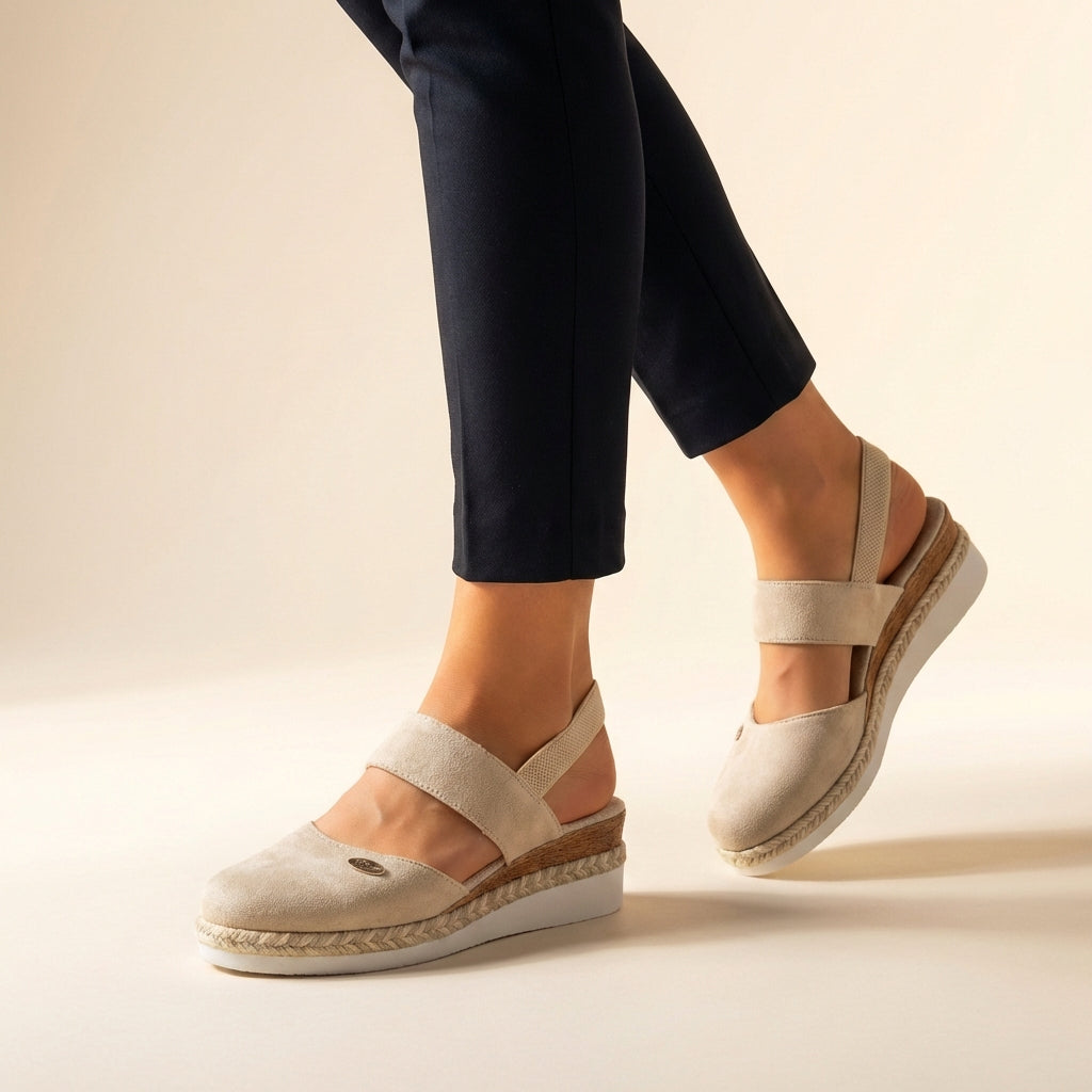 Beatrice wearing Women's Comfort Fit Orthopedic Espadrille Platform Sandals in beige with wide elastic straps and jute-wrapped platform sole