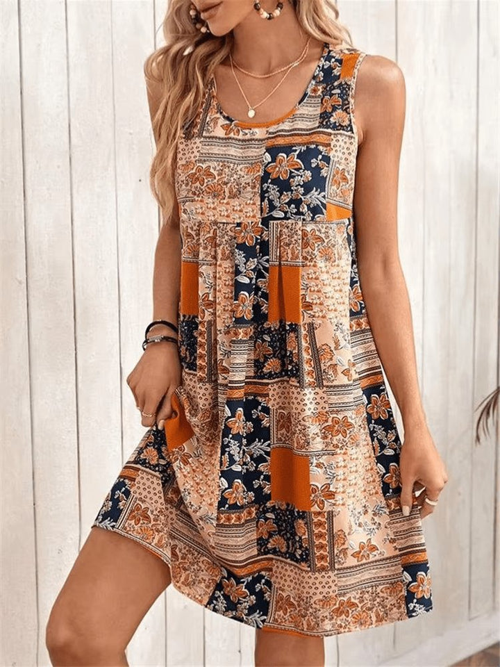 Cecily Boho Patchwork Mini Dress Sleeveless Summer with scoop neckline and empire waist in warm amber and navy tones