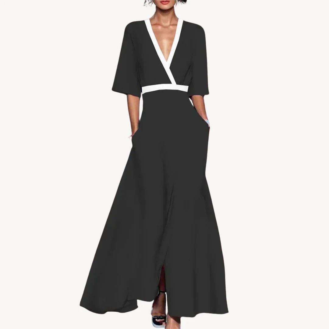 Women's Elegant Maxi Wedding Guest Evening Dress in black with white contrast trim and deep V-neckline