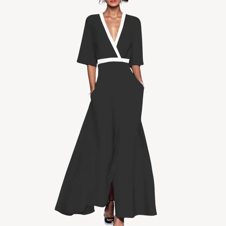 Women's Elegant Maxi Wedding Guest Evening Dress in black with white contrast trim and deep V-neckline