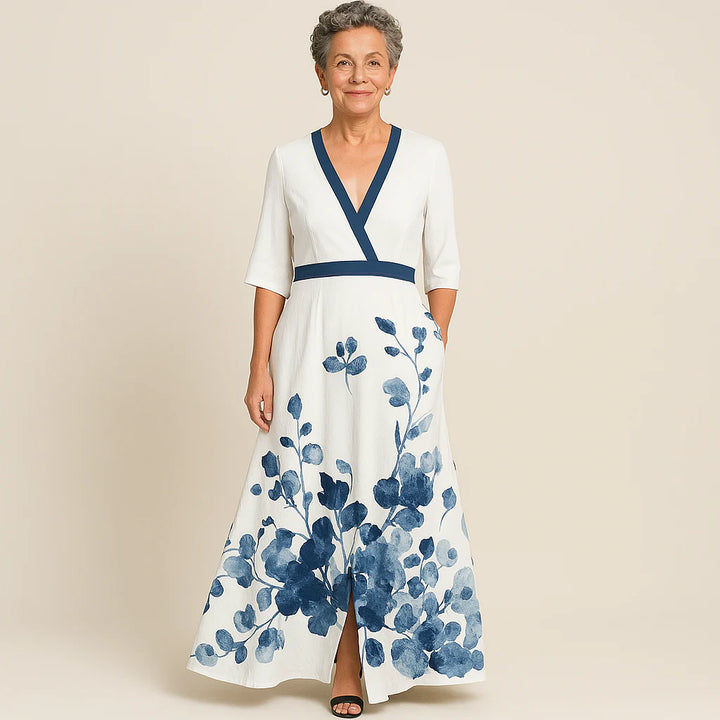 Detail shot of Women's Elegant Maxi Wedding Guest Evening Dress contrast white trim and structured fabric