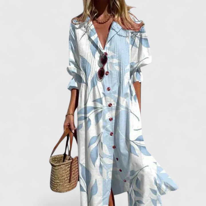Woman wearing Women's Floral Button Front Midi Dress with botanical print and button closure in natural light