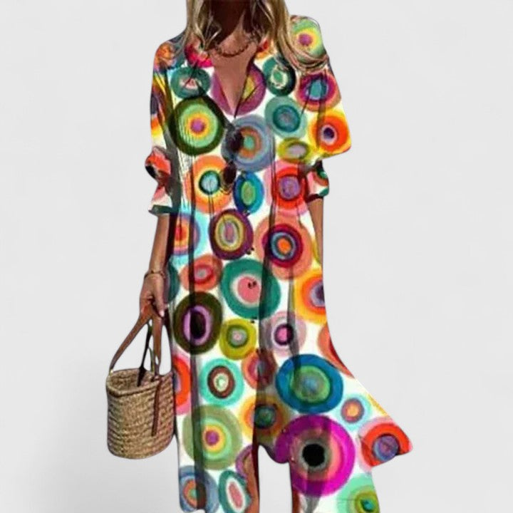 Back view of Women's Floral Button Front Midi Dress highlighting relaxed silhouette and midi hemline