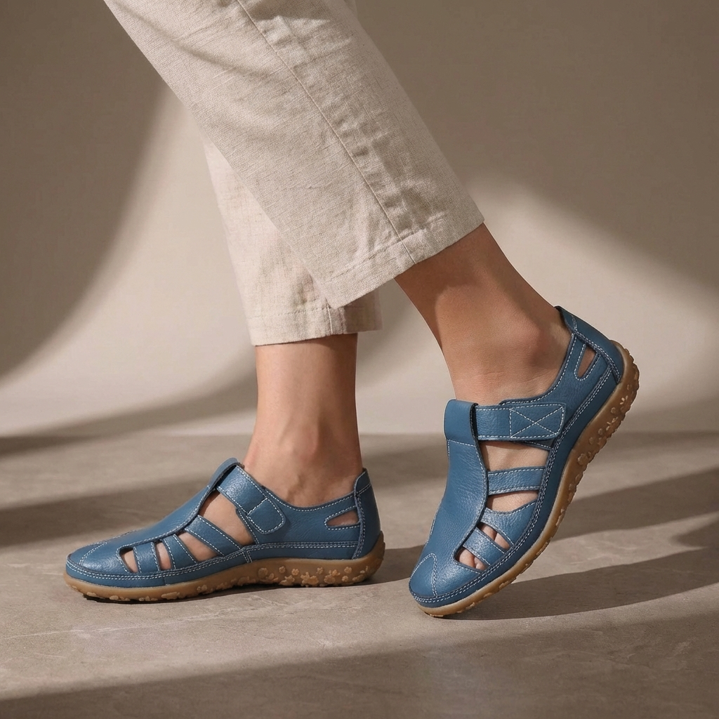 Side view of Women's Orthopedic Adjustable Strap Closed Toe Sandals showing cut-out detailing and hook-and-loop fastenings