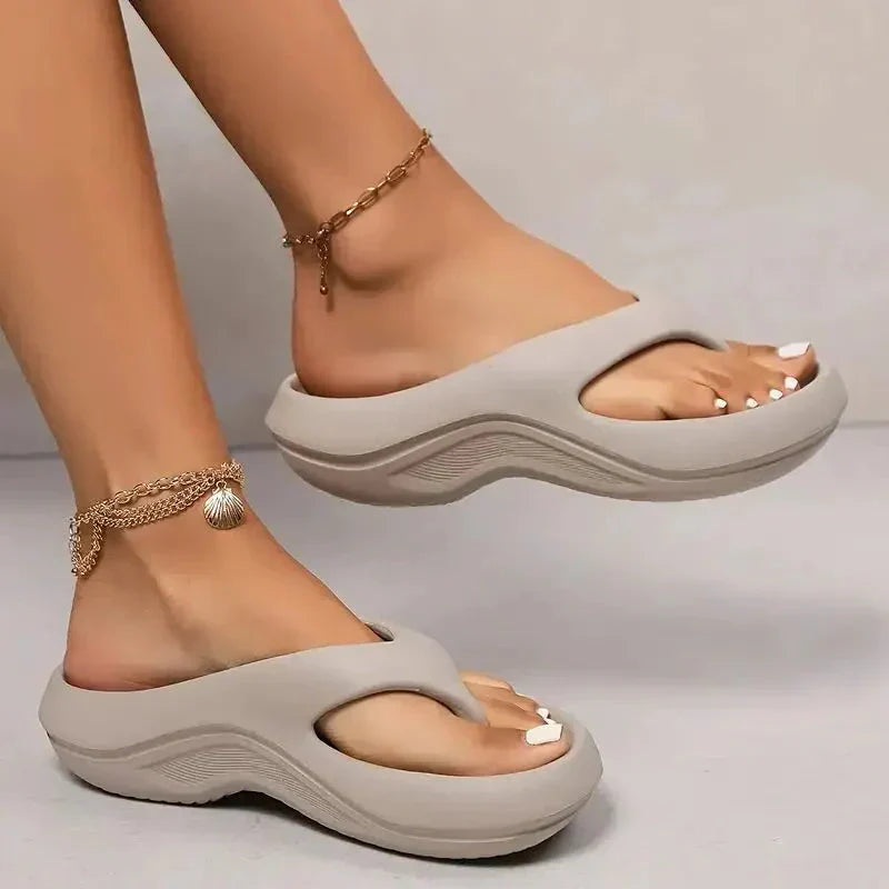 Close-up view of women's orthopedic sandals showing contoured footbed and wide toe opening construction