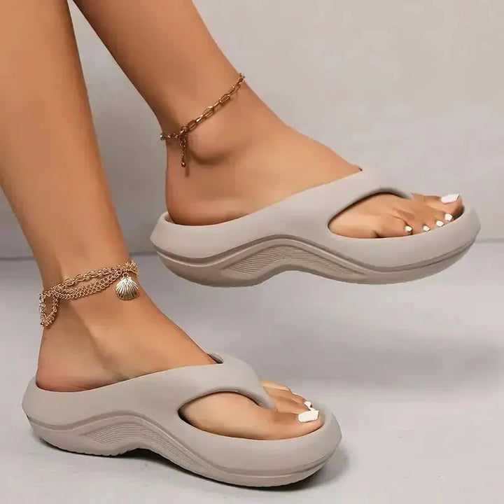 Close-up view of women's orthopedic sandals showing contoured footbed and wide toe opening construction