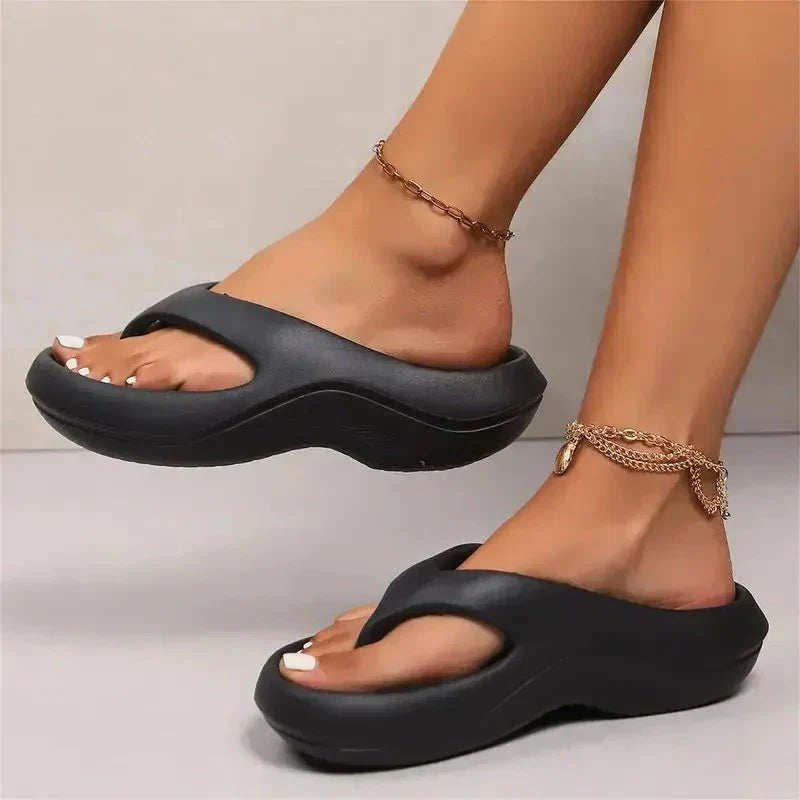 Detailed view of moulded footbed construction in women's orthopedic sandals for natural foot positioning