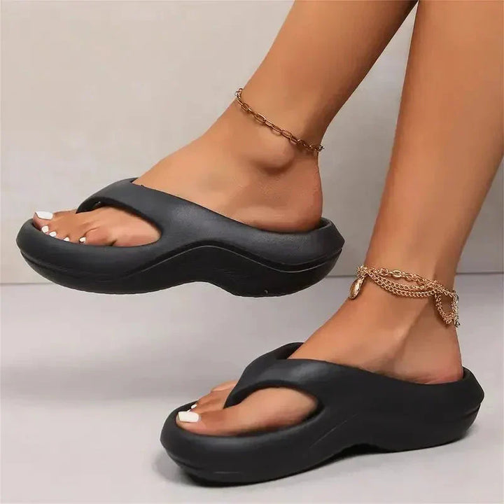 Detailed view of moulded footbed construction in women's orthopedic sandals for natural foot positioning