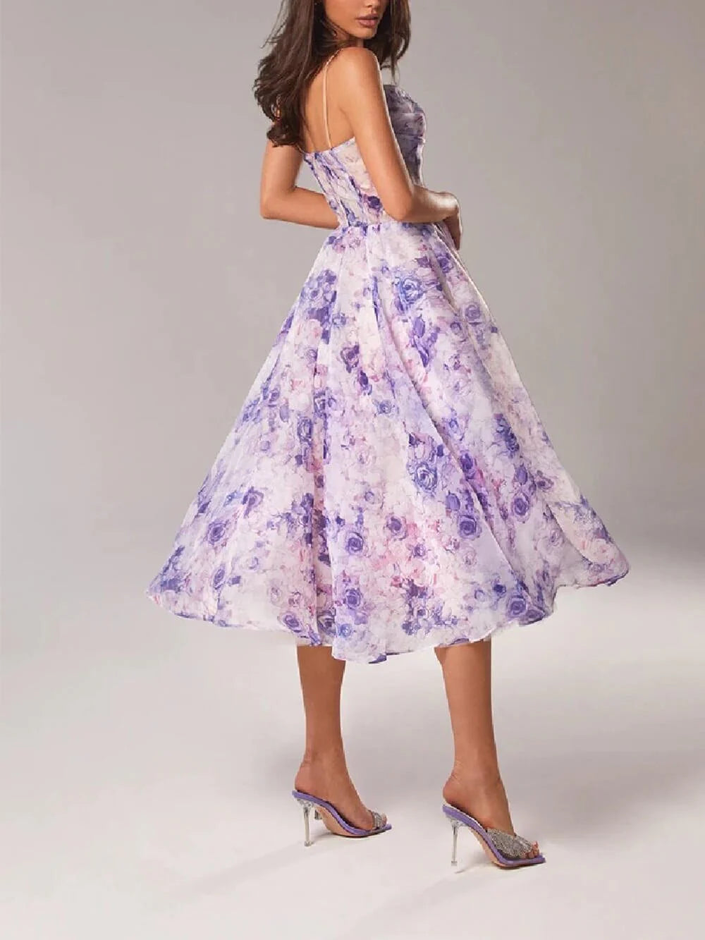 Full-length floral A-line midi dress with voluminous skirt and painterly pink rose print for wedding guest occasions