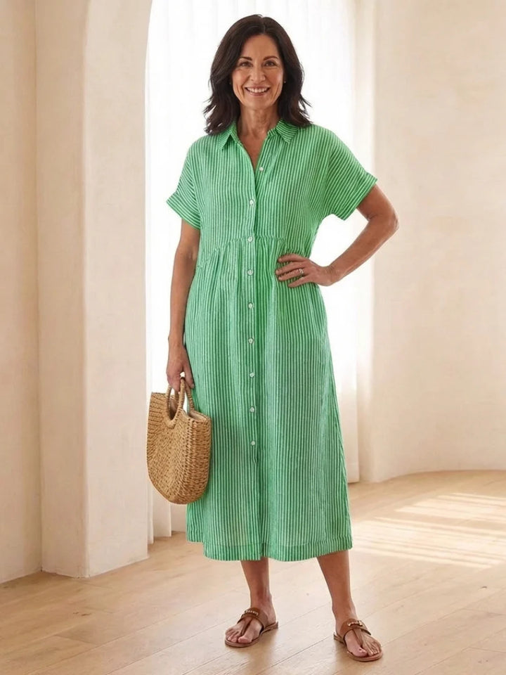 Styling view of button front midi dress paired with sandals for casual wear