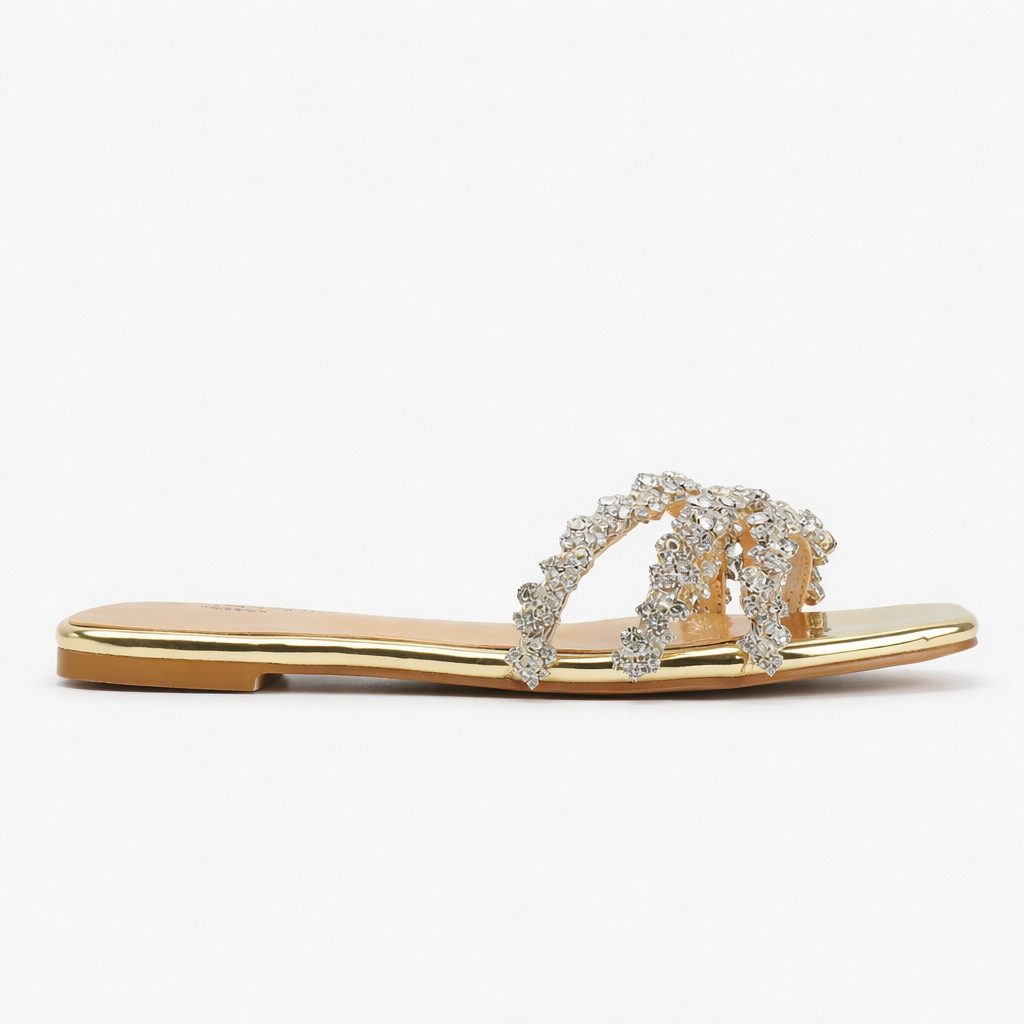 Full view of women's diamante flat sandals showing slip-on design and metallic finish
