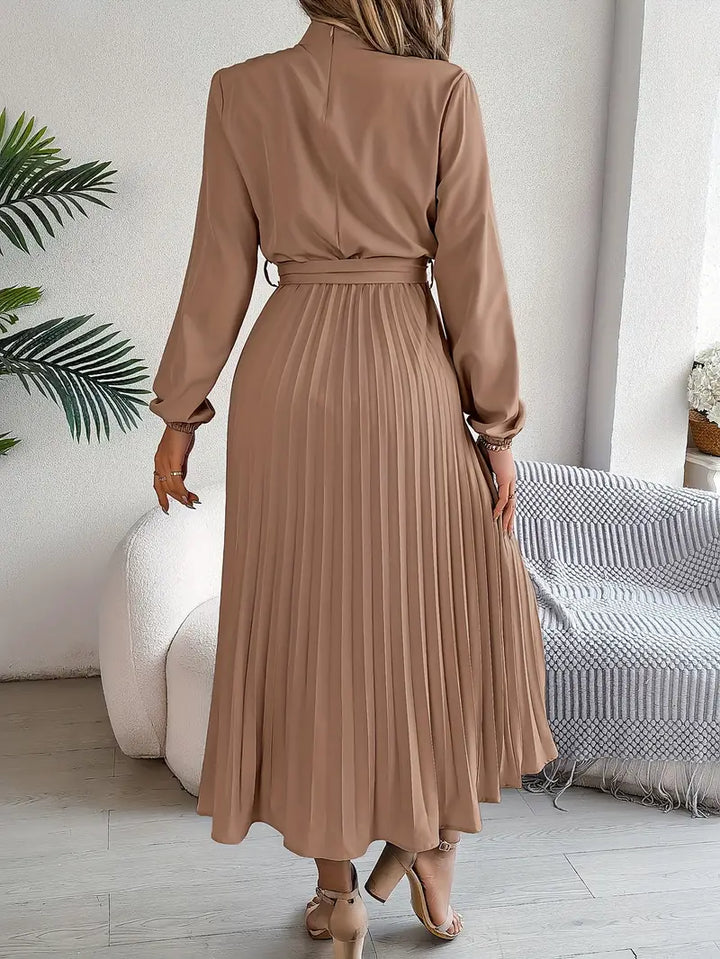 Women's Long Sleeve Pleated Belted Dress in pink with blouson sleeves and pleated detailing