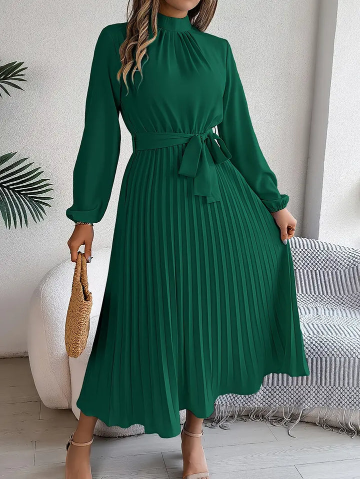 Close-up of gathered bodice and elasticated cuff sleeves on Women's Long Sleeve Pleated Belted Dress