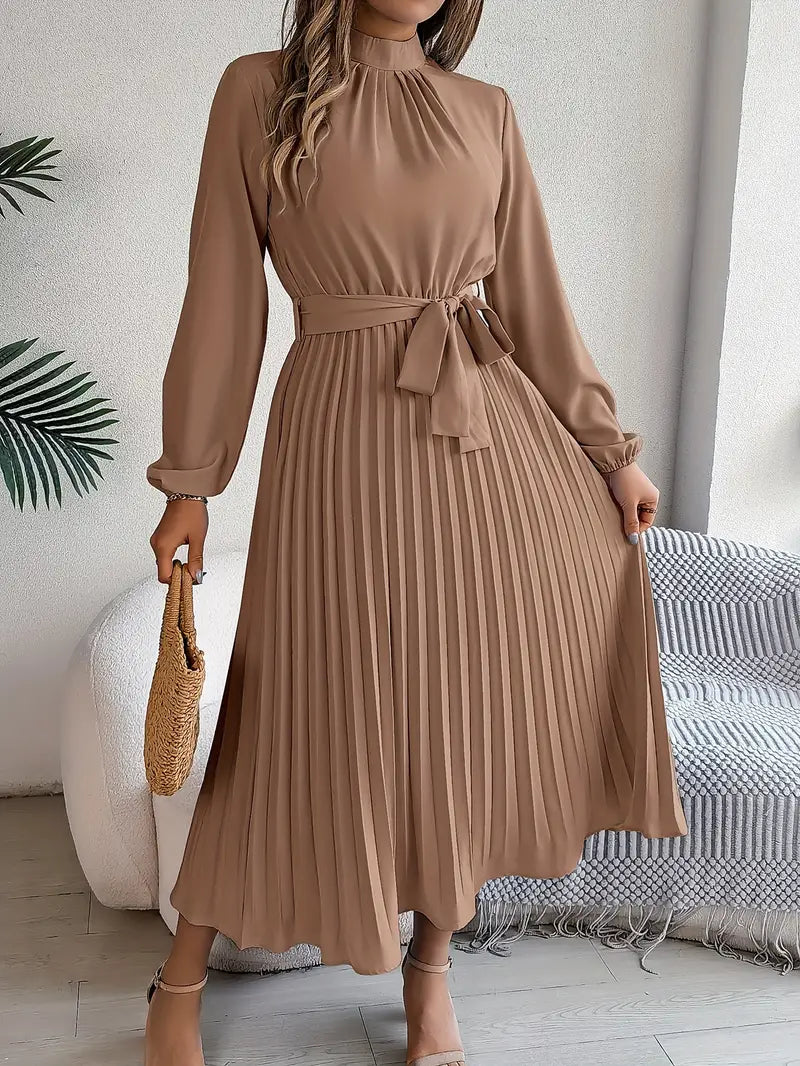 Women's Long Sleeve Pleated Belted Dress in burgundy shade with flowing midi-length skirt