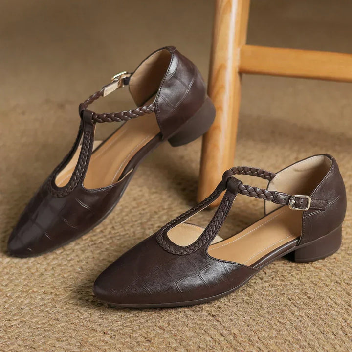 Women's Soft Leather Mary Janes worn with black trousers showing secure T-strap fit