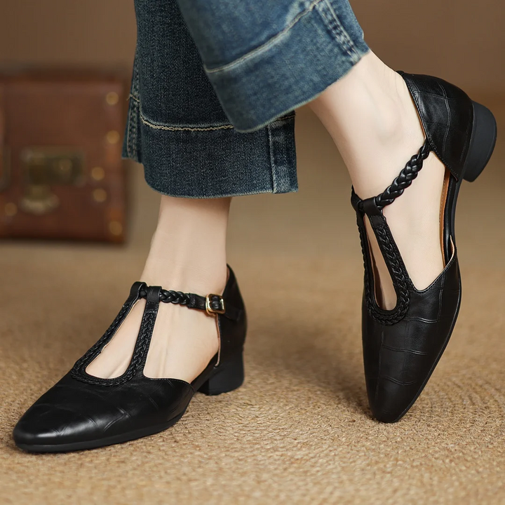 Front view of pointed toe Soft Leather Mary Janes with visible stitching pattern