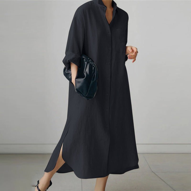 Side view of black oversized linen shirt dress showing midi length and subtle side slits