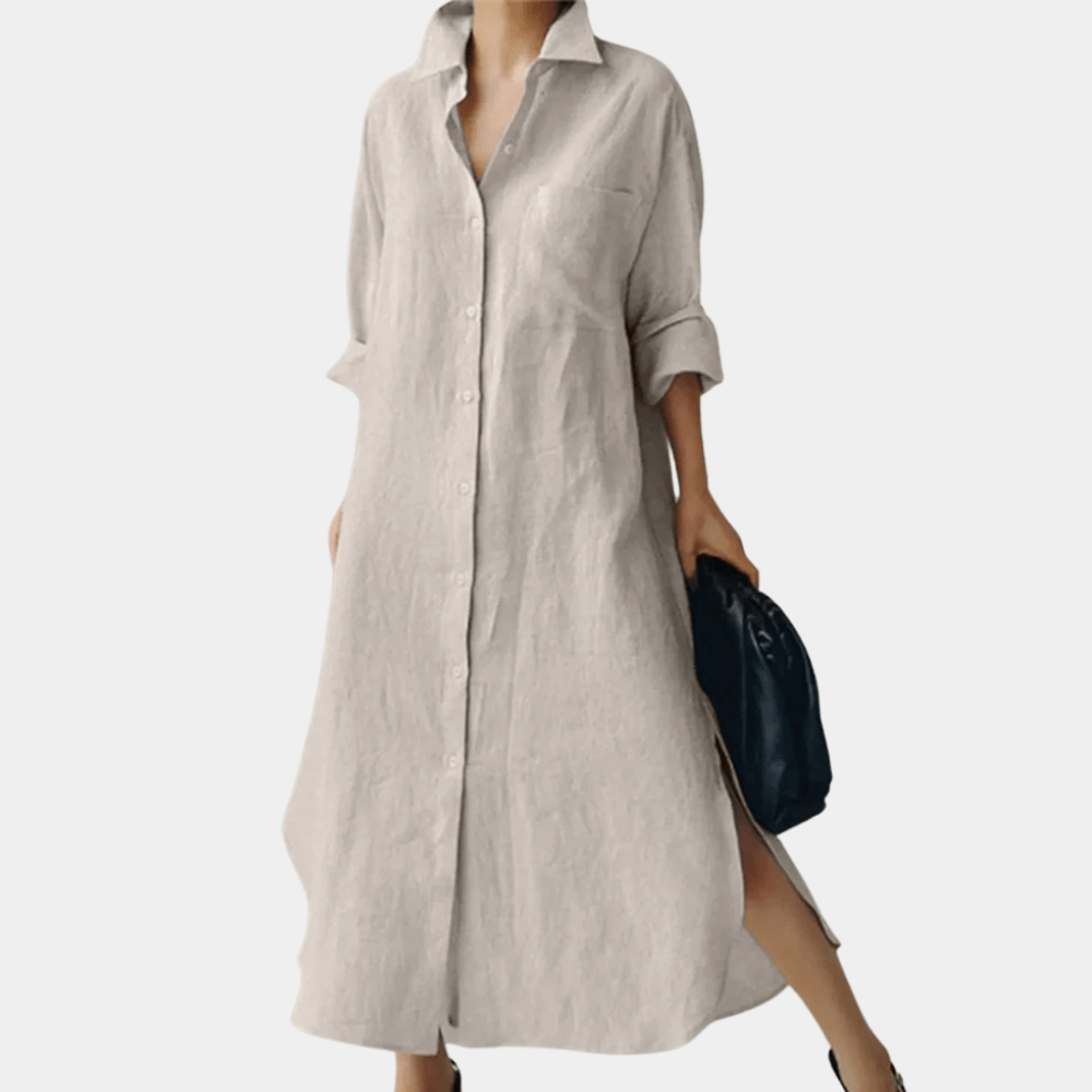 Woman styling black oversized linen shirt dress with handbag for casual summer look