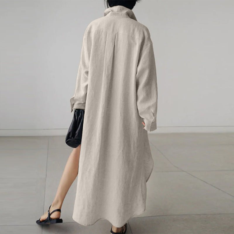 Detail of flowy silhouette and side slit on black linen midi shirt dress