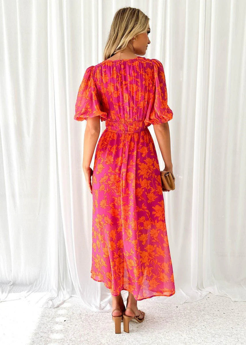 Flowing midi-length dress with elasticated waist and puff sleeves in bold floral print