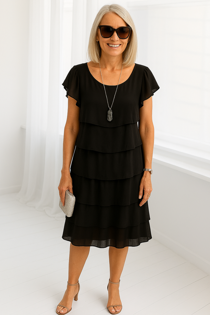 Close-up view of the Women's Layered Midi Dress showing the cascading tiered layers and smooth fabric drape