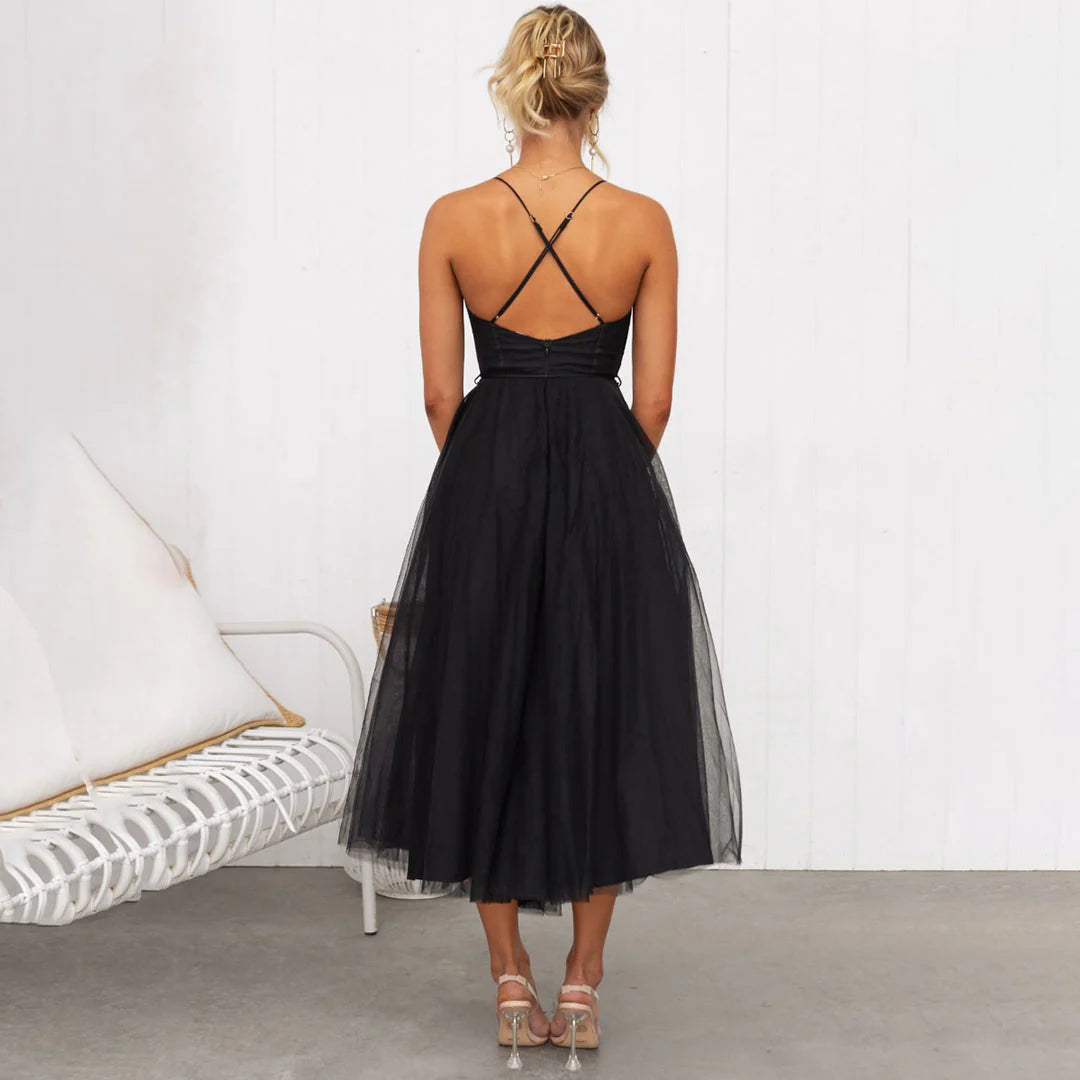 Full-length view of corset tulle midi dress in brown paired with heeled sandals
