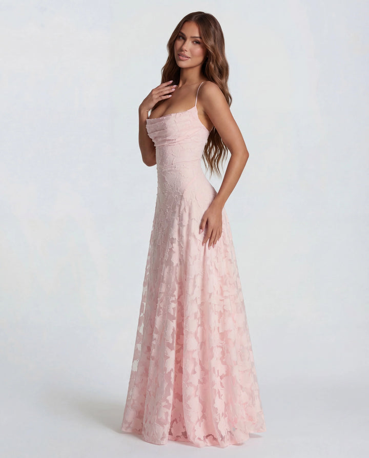 Close-up of textured floral lace detail on maxi dress bodice and skirt
