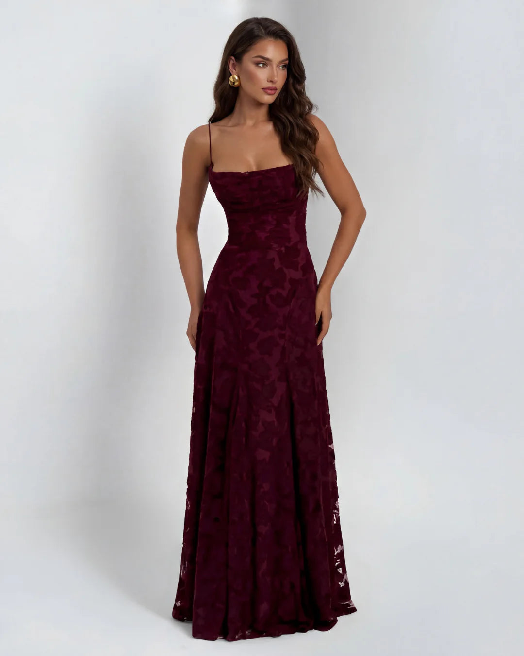 Floral lace maxi dress shown in full length with dimensional appliqué detail