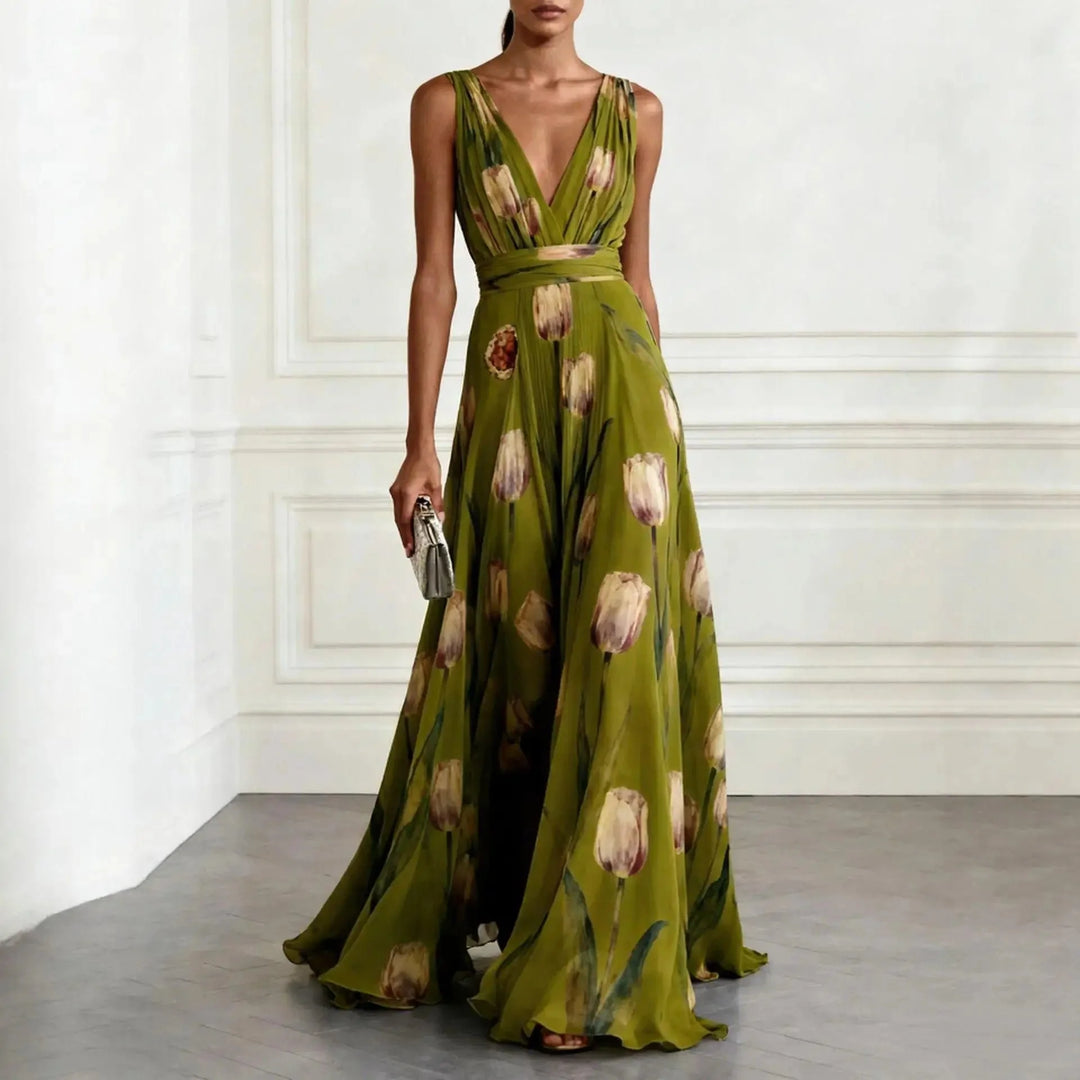 Floor-length floral dress with tie waist detail and graceful drape